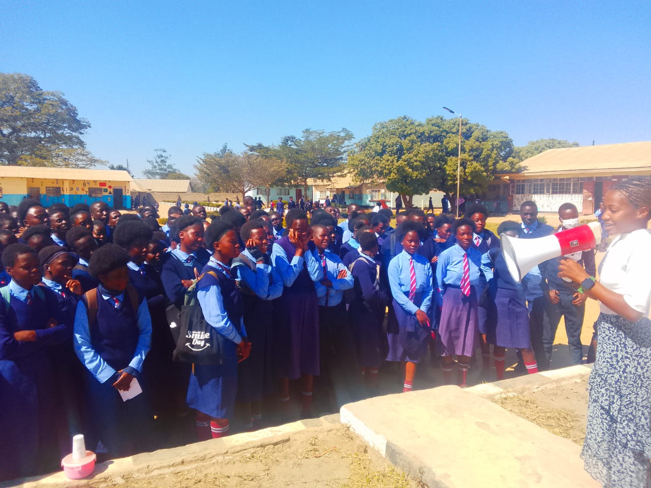 Students gathered during a school outreach session