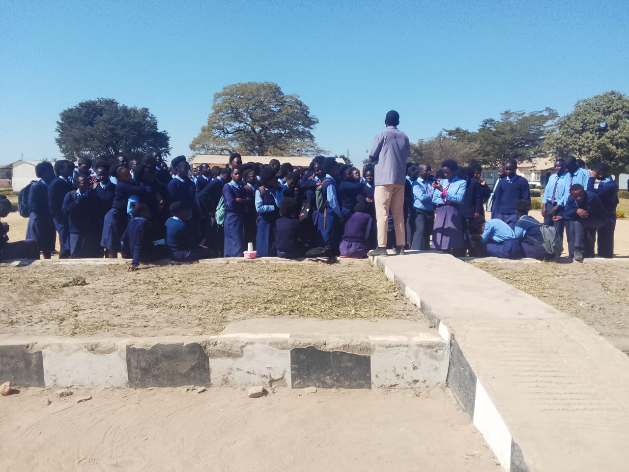 Forge Ambassador addressing students during a school assembly